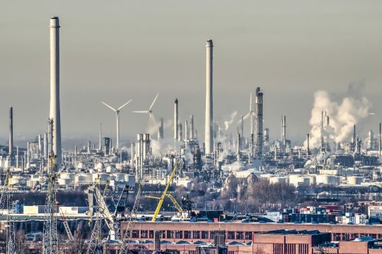 Oil refinery and wind turbines